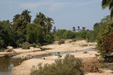 Gathering Sand Up River